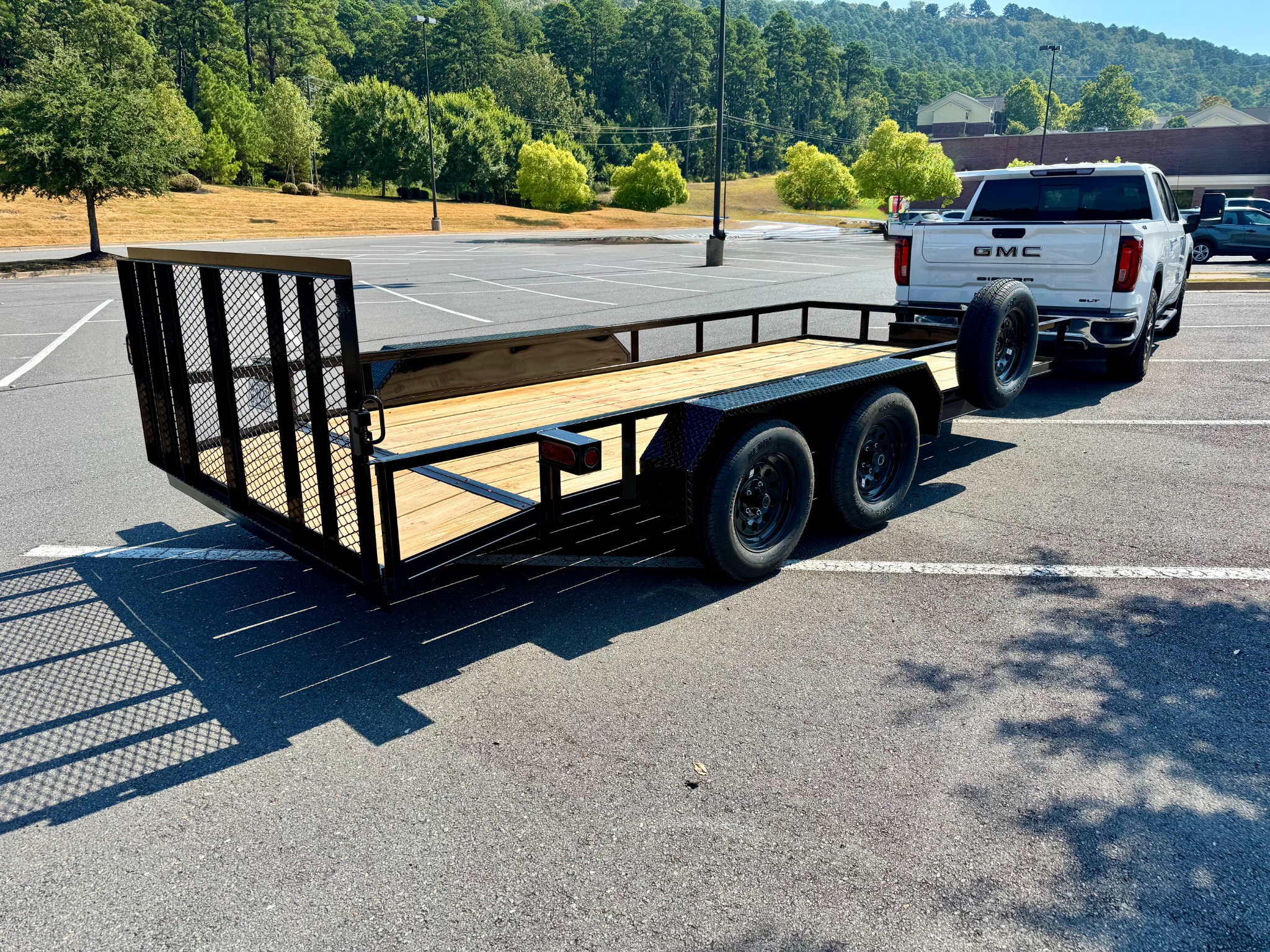 Another angle of the utility trailer and loading gate